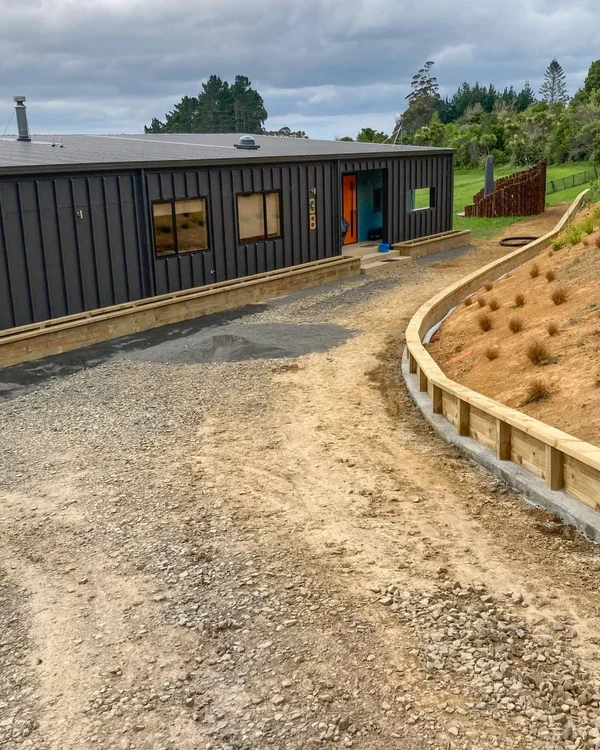 A recently levelled and graded driveway awaiting concrete pour by Brix team